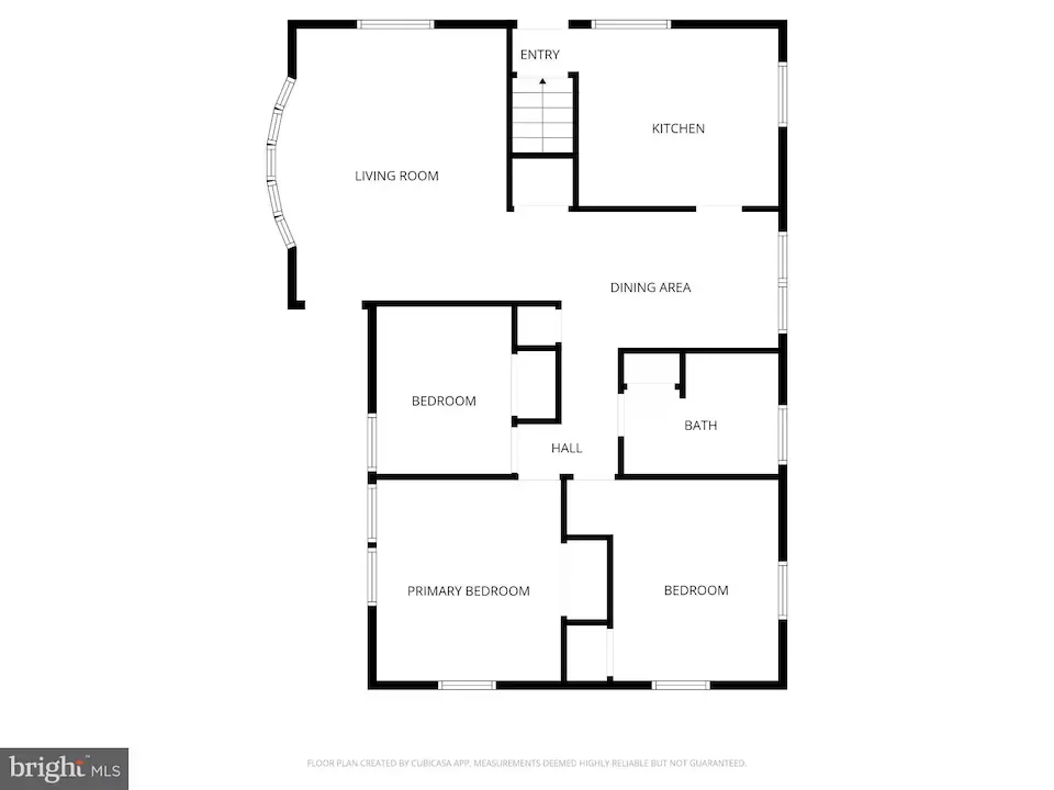 Floor plan of a home showing entry with stairs, living room to the left, kitchen to the right, and a central dining area with three bedrooms and one bath connected by a hall.